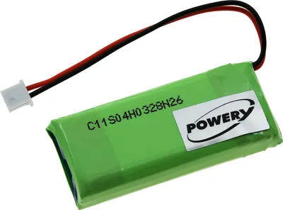 A green battery pack with a white label and wires.