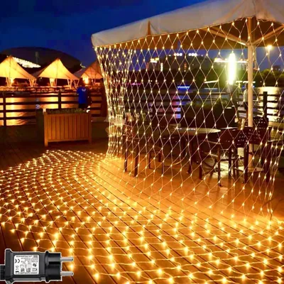 Produktbild von 660 LED Lichternetz 6 x 4 m warmweiß Lichterkette Netz Trafo Timer 8 Modi Lichtketten für Weihnachten, Halloween, Party, Geburstag, Hochzeit Geeignet für Innen und Außen