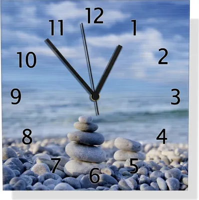 Produktbild von Wallario Design Wanduhr Steinstapel am Strand aus Aluverbund, Größe 30 x 30 cm