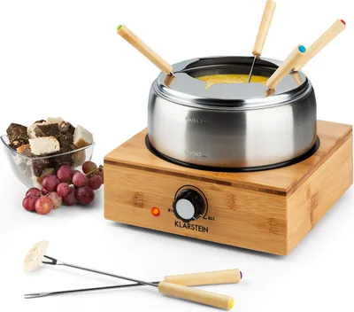 Produktbild von Klarstein Bambus Fondue, 800 Watt, Edelstahl-Topf, Gerätebasis aus Bambus, Füllmenge 1,3 Liter max., Heizplatte aus Edelstahl, Thermostat, Gabelhalter-Aufsatz, 6 Edelstahl-Fonduegabeln, bambus