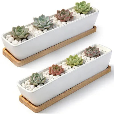 Zdjęcie produktu dla Zestaw dwóch białych doniczek ceramicznych z otworami drenażowymi