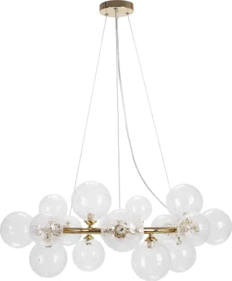 A chandelier with multiple glass globes hanging from a central bar, suspended by wires from a ceiling mount.