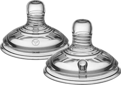 Two clear baby bottle nipples are shown against a white background.