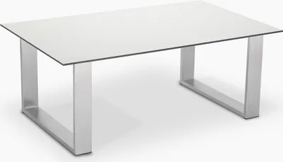 A white rectangular coffee table with silver metal legs on a white background.