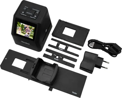 A collection of digital film scanner components laid out on a white surface.