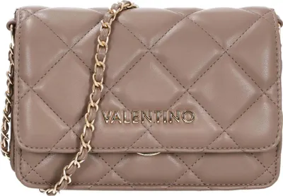 A close-up studio shot of a taupe Valentino handbag with a gold chain strap.