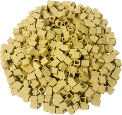 A pile of small, light beige LEGO bricks.