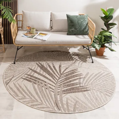 Produktbild von In- & Outdoor Teppich Rund - Tiga Palm Taupe - Ø 240cm - Boho, Ländlich, Modern - Wohnzimmer, Balkon, Garten / Terrasse -  FRAAI | Home & Living