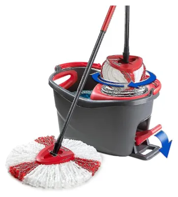 A spin mop and bucket set is shown against a white background. The mop head is detached and lying on the floor, while the bucket has a mechanism for spinning the mop head inside it.