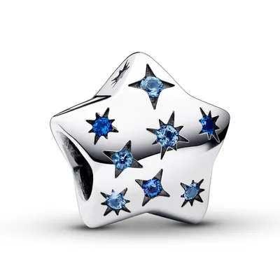 A star-shaped charm with blue gemstones.