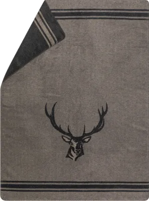 A folded blanket with a deer head graphic and striped borders.