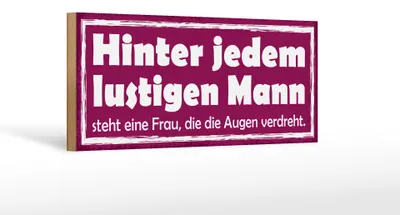 Produktbild von Holzschild Spruch 27x10cm hinter lustigen Mann eine Frau