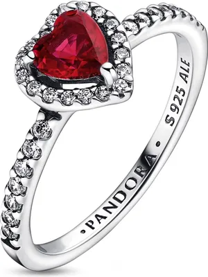 A close-up studio shot of a Pandora ring with a red heart-shaped stone.