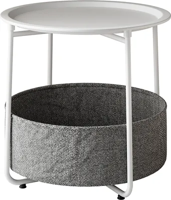 A white round side table with a grey fabric basket underneath.
