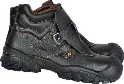 A pair of brown leather work boots with black soles and a buckle closure.