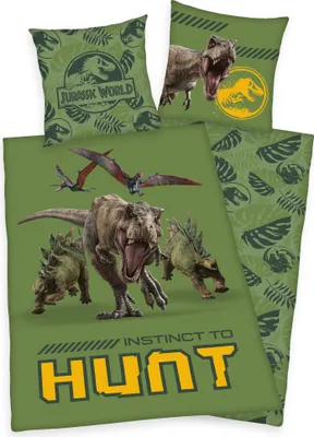 A collection of Jurassic World themed bedding items, including pillowcases and a duvet cover, featuring various dinosaurs and the Jurassic World logo.