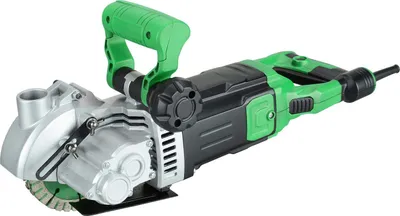 A wall chaser tool with a green handle and black body, shown against a white background.