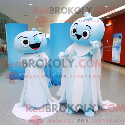 Produktbild von Maskottchenfigur REDBROKOLY eines himmelblauen Rochens mit Brautkleid und Handtaschen