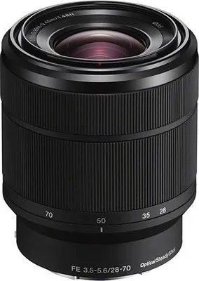 A studio shot of a black camera lens.