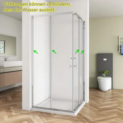 A modern bathroom with a corner shower enclosure, toilet, and sink.