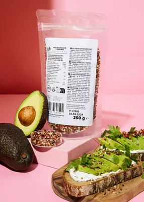 A product shot of avocado topping with avocados and avocado toast.