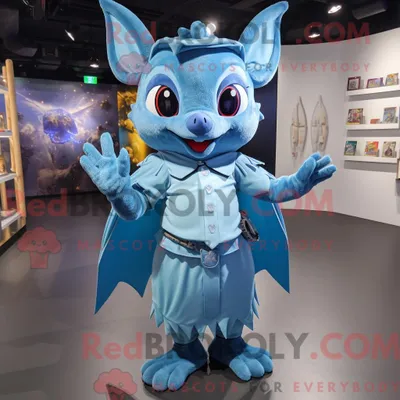 Produktbild von Maskottchencharakter REDBROKOLY einer himmelblauen Fledermaus mit Faltenrock und Armbändern