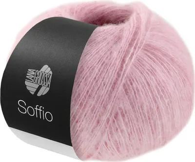 A ball of pink yarn with a black label.