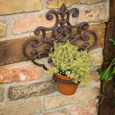 Produktbild von Blumentopfhalter wie antik, Blumenwandhalter aus Gusseisen, Topfhänger in braun