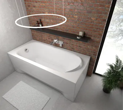 A white bathtub in a bathroom with a brick wall background.