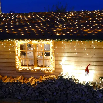 Immagine prodotto di Gartenpirat, catena luminosa a batteria - 3 x 3 metri - 200 LED bianco caldo con timer - Adatta per interni ed esterni - Decorazione per il giardino