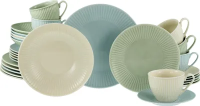 A collection of pastel-colored ceramic plates and cups.