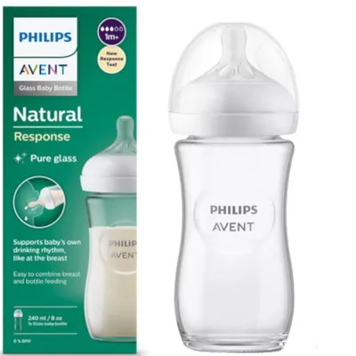 A Philips Avent glass baby bottle and its packaging are shown side-by-side against a white background.