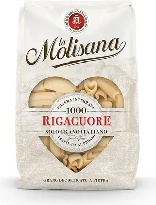 A bag of pasta with a heart-shaped window showing the product inside.