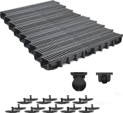 A set of black drainage channels and accessories are displayed against a white background.