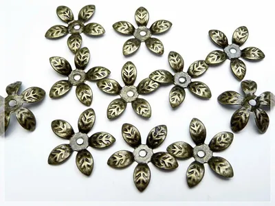 Produktbild von Vintageparts Perlkappen filigran antik Bronze Blüte 15 mm, 20 Stück
