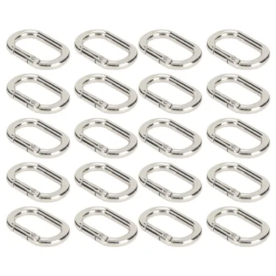 Zdjęcie produktu dla zestaw 20 owalnych klamer sprężynowych 23 mm, karabińczyki ze stopu aluminium do breloków, torebek, toreb, w kolorze złotym, srebrnym i czarnym