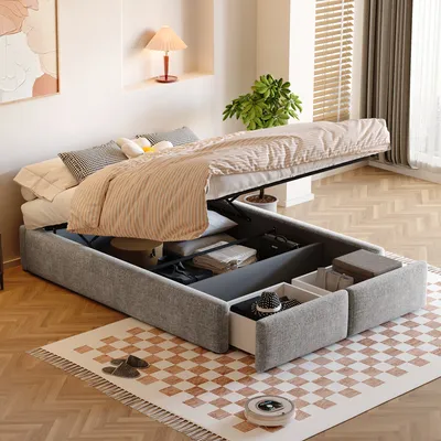 A bedroom scene with a bed that has its storage compartment open, revealing stored items. The bed is placed on a rug in a room with wooden flooring and blinds.