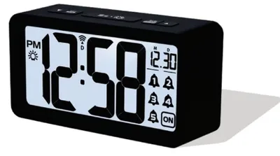 A digital alarm clock is shown against a white background.