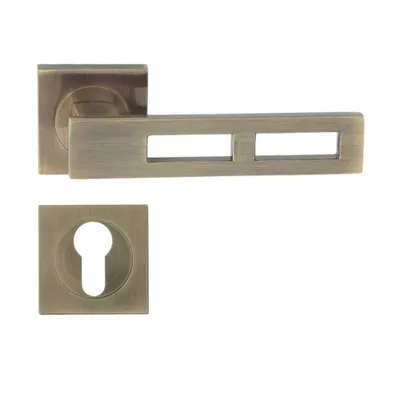 A door handle set with a keyhole escutcheon, presented on a white background.