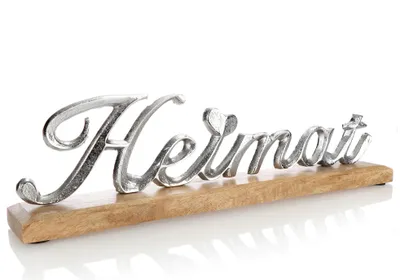 Produktbild von com-four® Deko Aufsteller "HEIMAT" - Schriftzug aus vernickeltem Aluminium auf Mangoholz-Sockel - Deko-Schriftzug zum Hinstellen