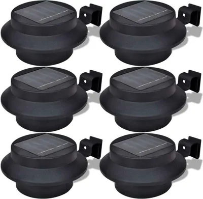 Six black solar-powered fence lights are arranged in a grid on a white background.