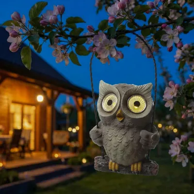 Produktbild von LED Solar Eule auf Schaukel - Gartenfigur mit leuchtenden Augen - H: 19cm - Lichtsensor