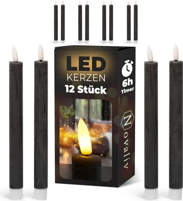 Produktbild von Stabkerzen LED mit Timer SCHWARZ 12 Stück indoor 6 Stunden ECHTWACHS 24cm Höhe für Kerzen 2,2cm Durchmesser 2 AAA Batterien notwendig LED Stabkerzen 4er Set SCHWARZ (drei Mal) bewegliche Flamme Licht