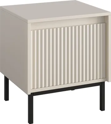 A standalone nightstand with a fluted drawer front and black metal legs.