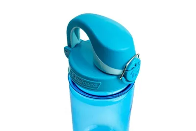 Close-up of the top of a blue Nalgene water bottle.