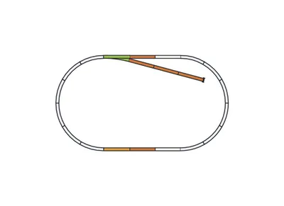 A top-down view of a model train track layout.