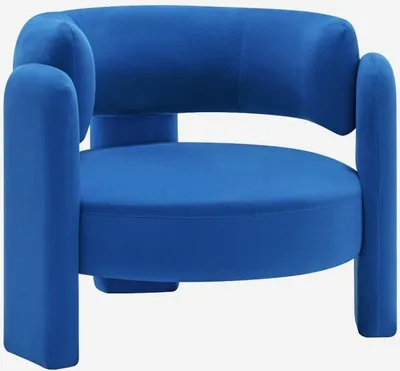 A studio shot of a blue armchair.