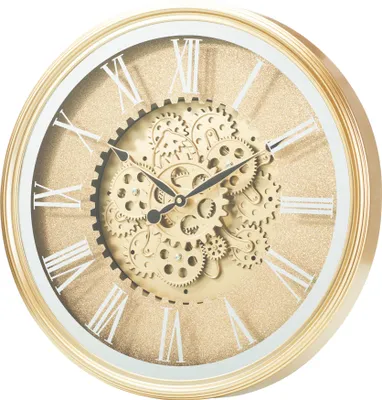 A close-up, studio shot of a gold wall clock with Roman numerals and a visible gear mechanism.