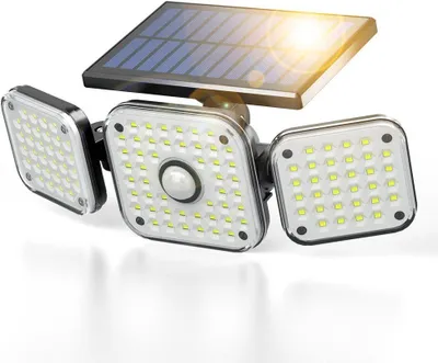 A solar-powered LED floodlight with three adjustable heads and a motion sensor, shown against a white background.