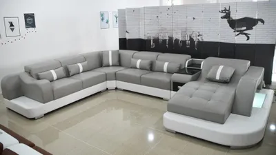 Image de Canapé d'angle moderne en cuir, design élégant, idéal pour un salon. Ensemble de canapés modulables pour créer une configuration personnalisée